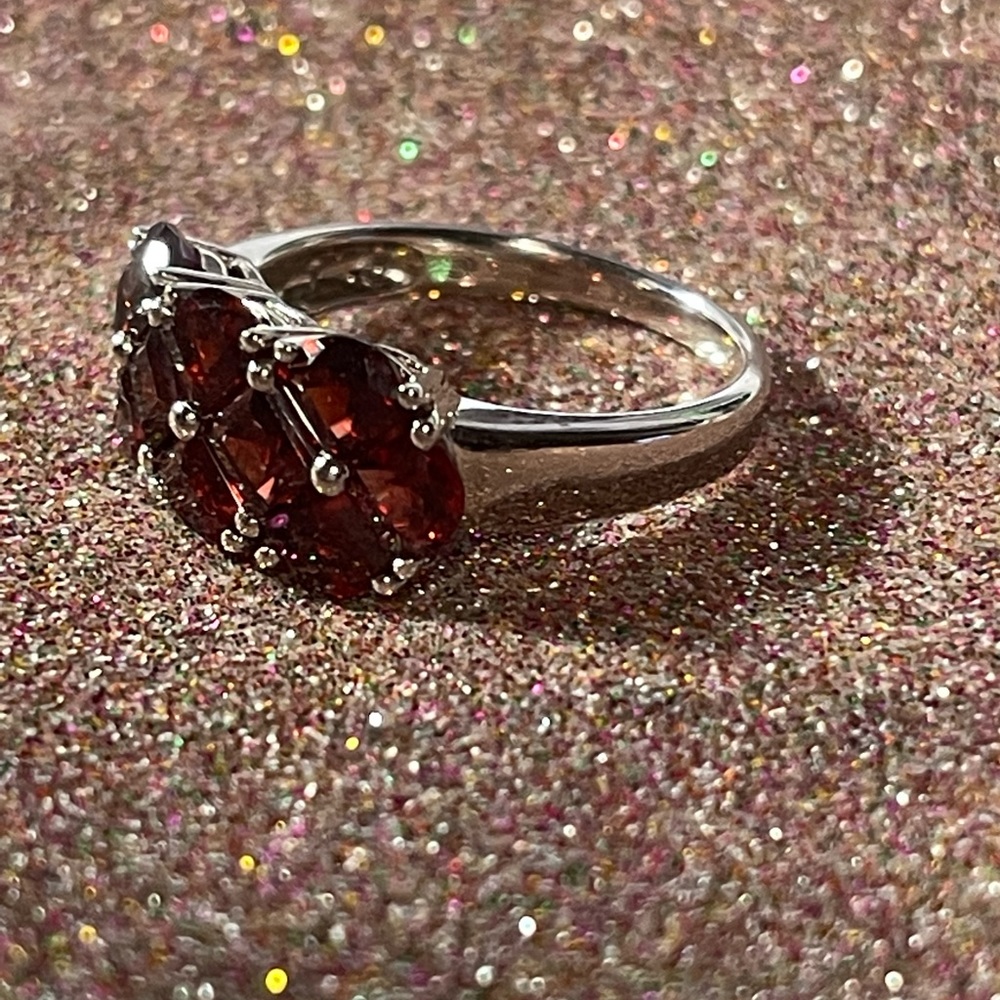 Sterling silver ring with red stones